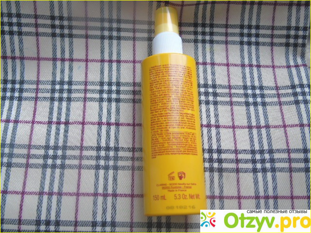 Солнцезащитное молочко-спрей для лица и тела Spray Solaire Lait-Fluide SPF 50 фото3