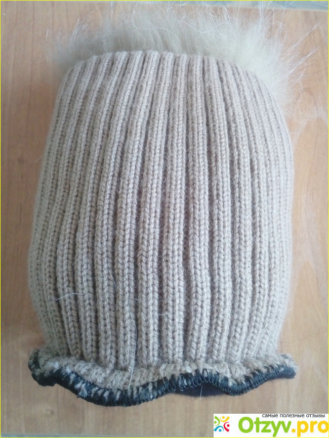Зимняя шапка из меха енота. фото4