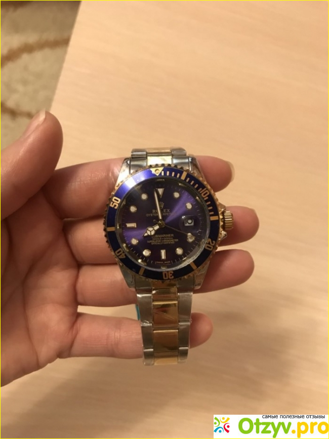 Часы именитого бренда Rolex.